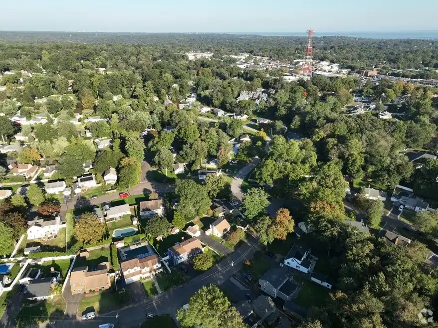 Aerial view of the Cranbury neighborhood in Norwalk with tree-lined residential streets and houses